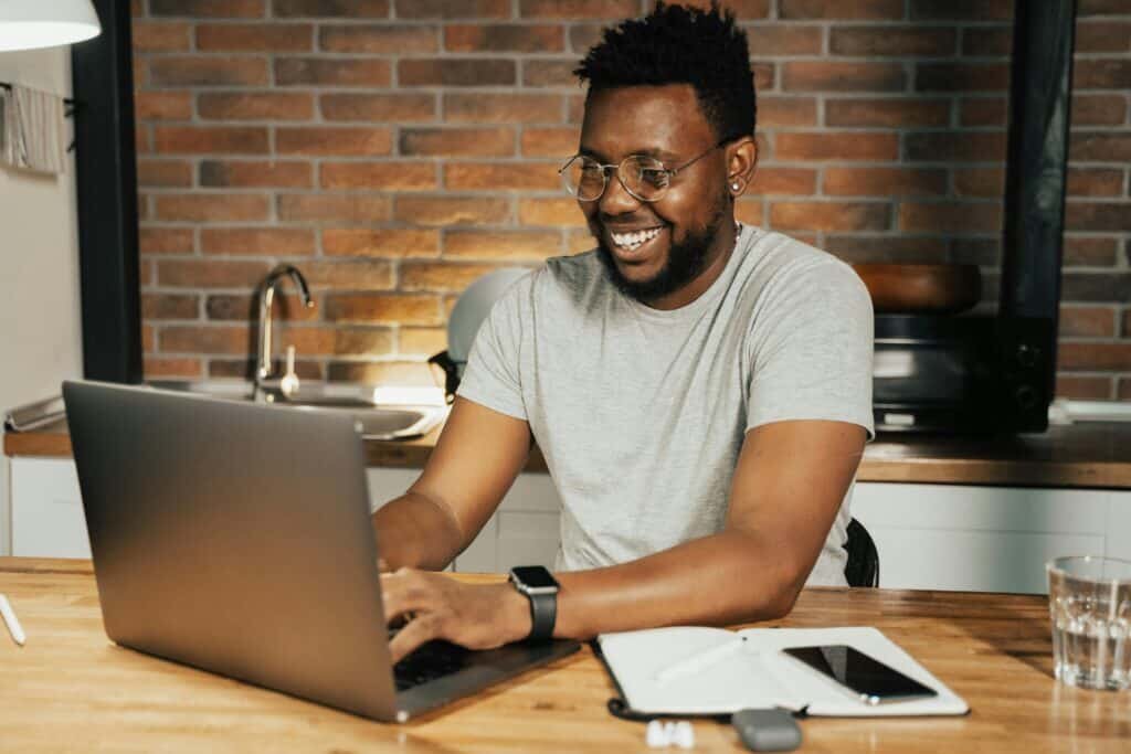 happy entrepreneur working on successful website