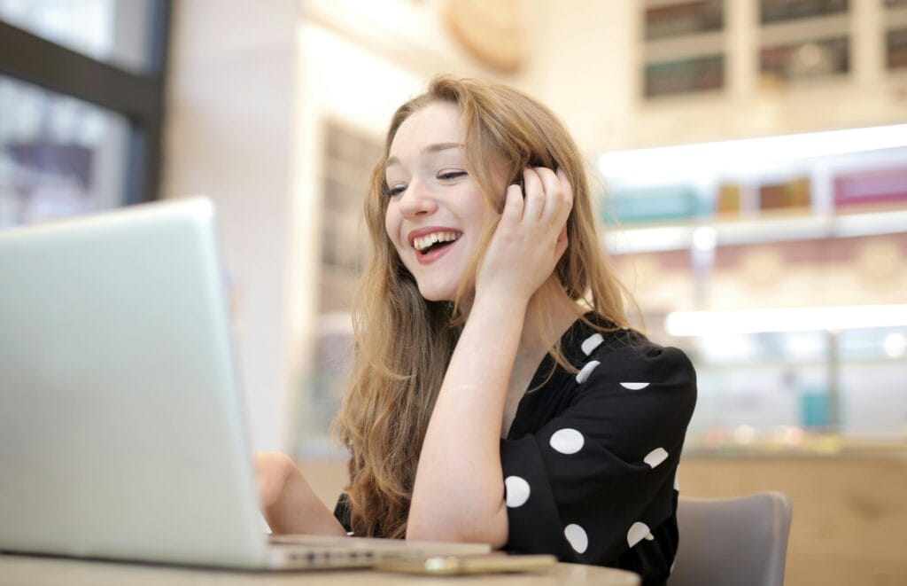 happy boss using website that converts